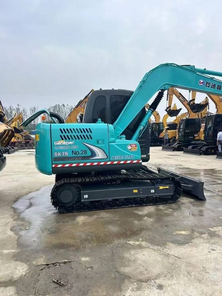 2025 Kobelco SK75 mini excavator side view 2025 Kobelco SK75 mini excavator side view