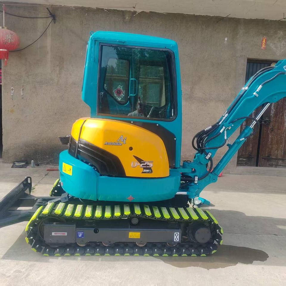 2023 Kubota U25 mini excavator side view 2023 Kubota U25 mini excavator side view