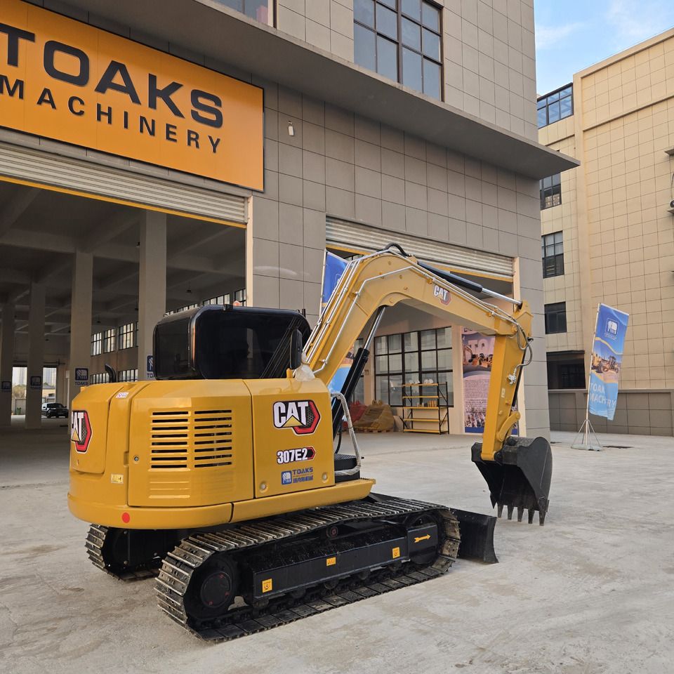 2024 Caterpillar 307E2 mini excavator, rear three-quarter view 2024 Caterpillar 307E2 mini excavator, rear three-quarter view