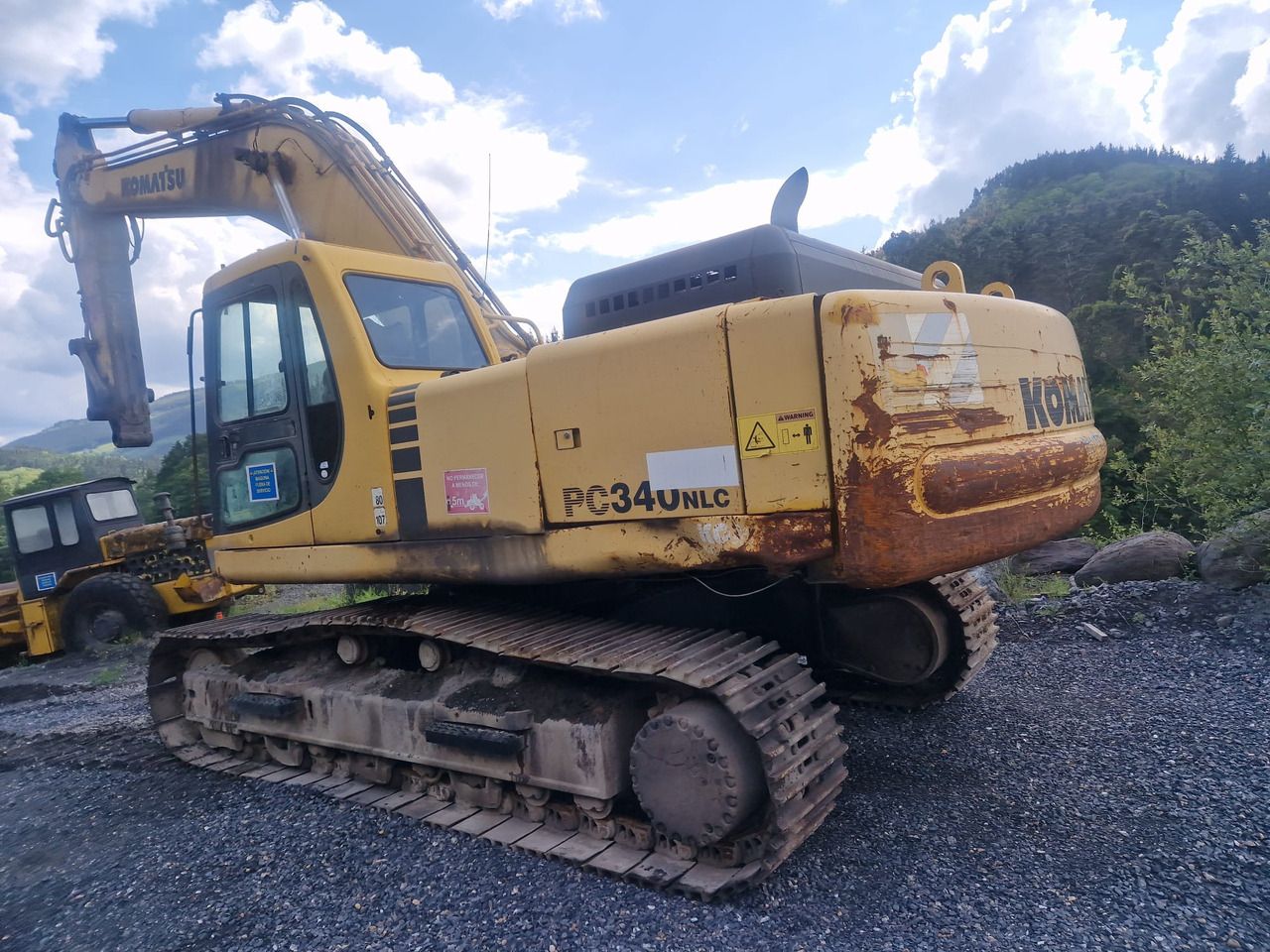 1999 Komatsu PC340NLC crawler excavator, rear three-quarter view