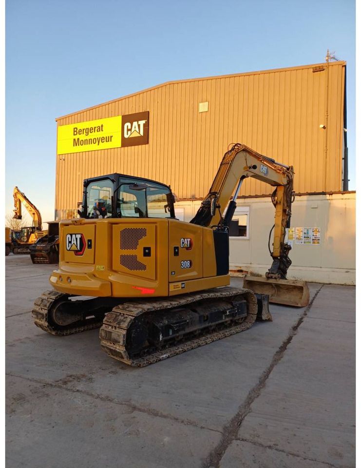 2023 Caterpillar 308 crawler excavator, rear three-quarter view 2023 Caterpillar 308 crawler excavator, rear three-quarter view