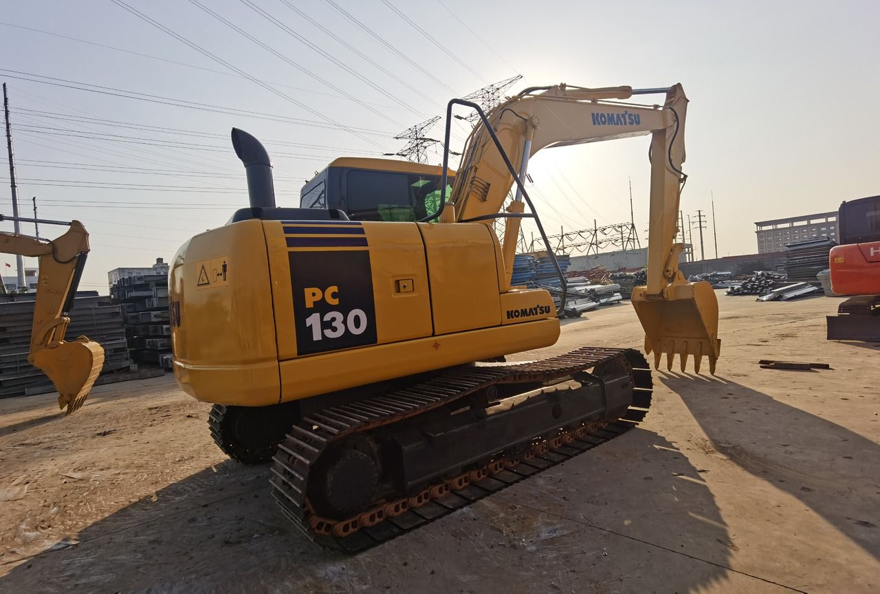 2021 Komatsu PC130-7 mini excavator, rear three-quarter view 2021 Komatsu PC130-7 mini excavator, rear three-quarter view