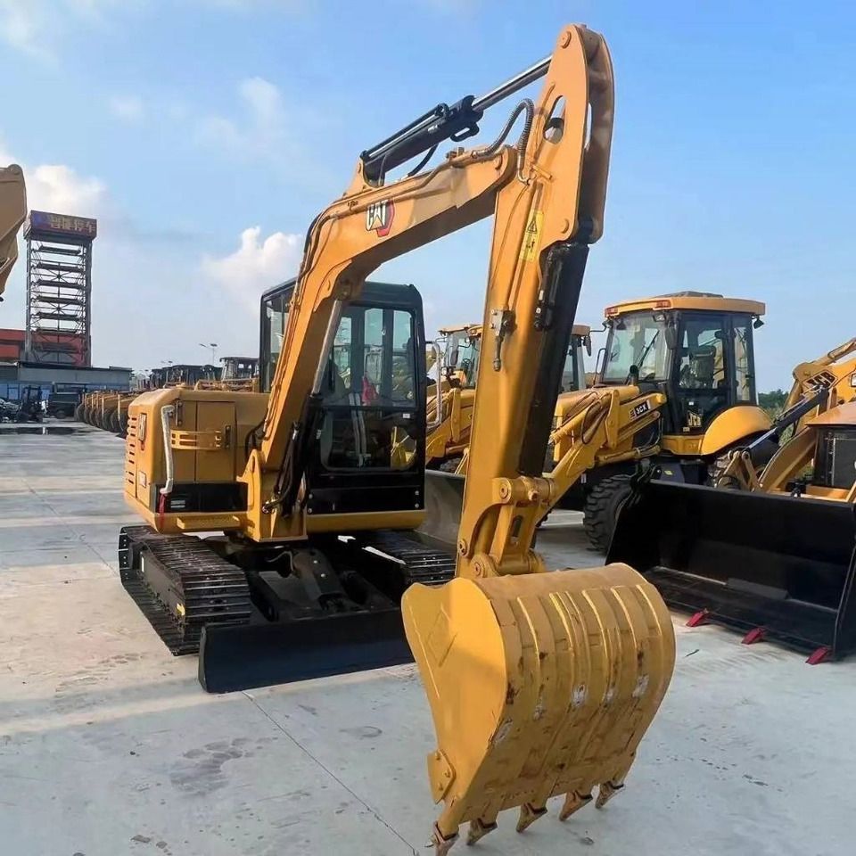 2023 Caterpillar 306E2 mini excavator, front three-quarter view 2023 Caterpillar 306E2 mini excavator, front three-quarter view