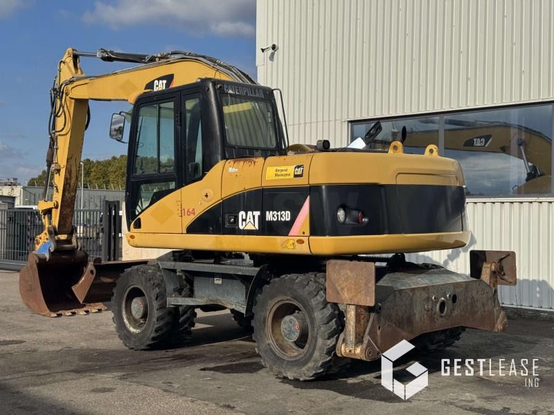 2008 Caterpillar M313D wheel excavator, side view 2008 Caterpillar M313D wheel excavator, side view