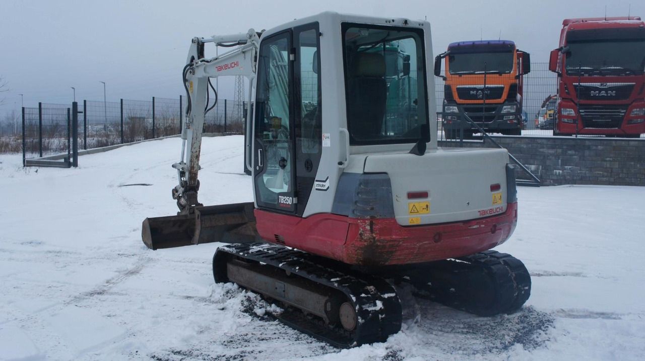 2012 Takeuchi TB250 mini excavator, rear three-quarter view