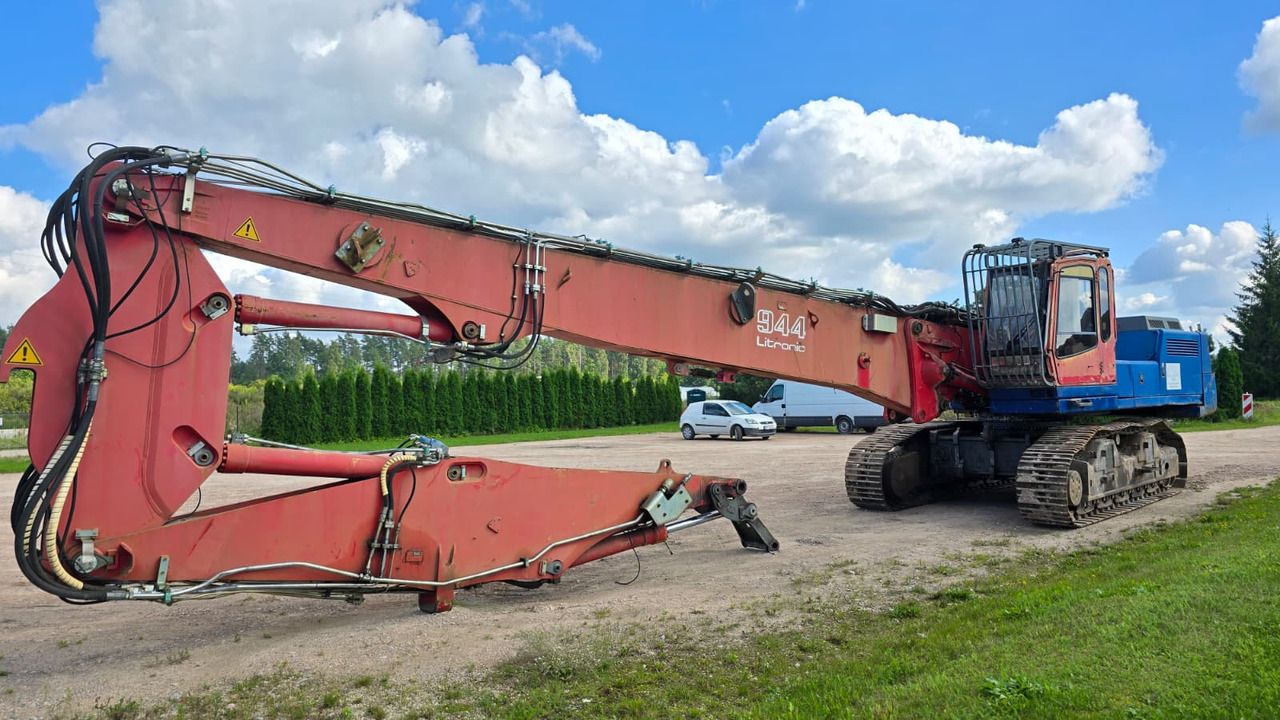 2006 Liebherr R944B VH-HD demolition excavator, side view with extra boom