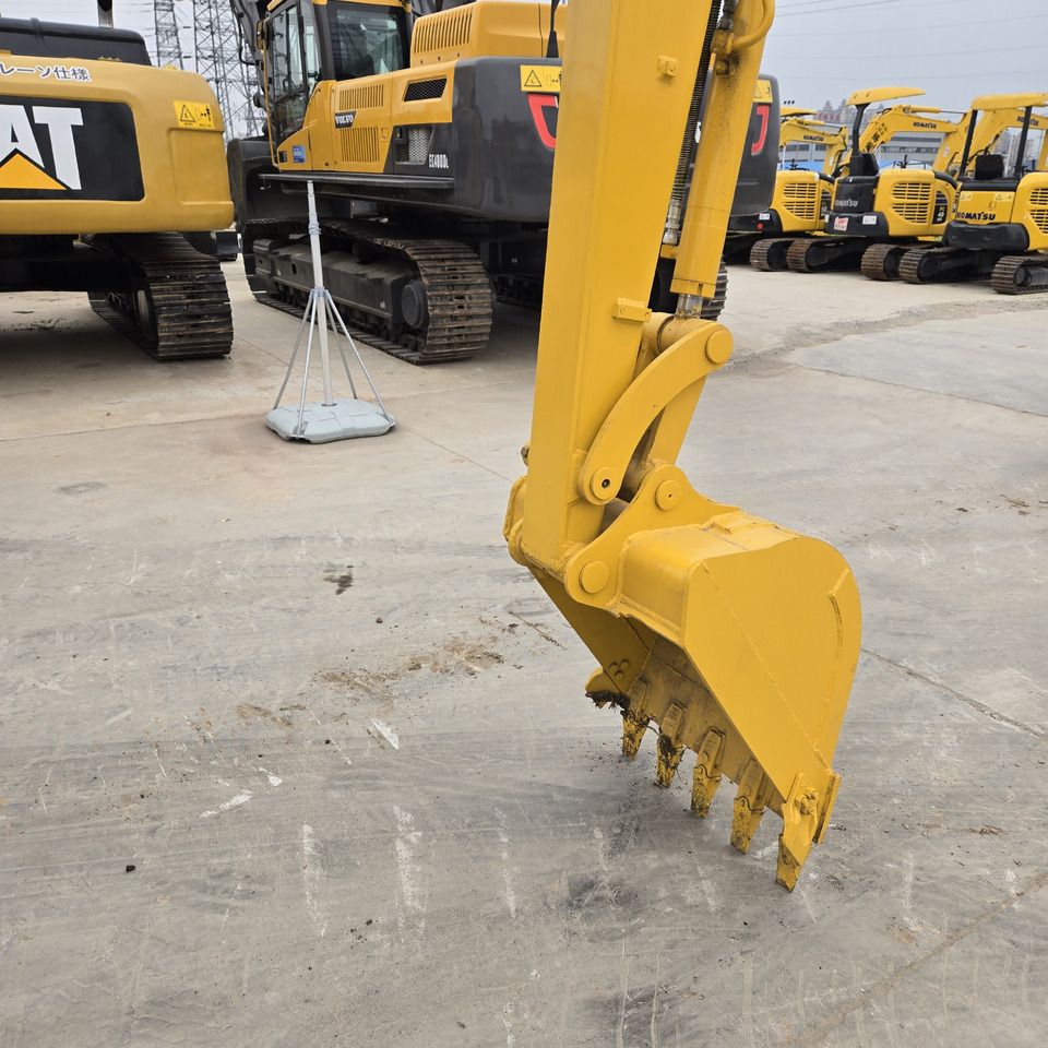 2022 Komatsu PC56 mini excavator boom and bucket detail 2022 Komatsu PC56 mini excavator boom and bucket detail