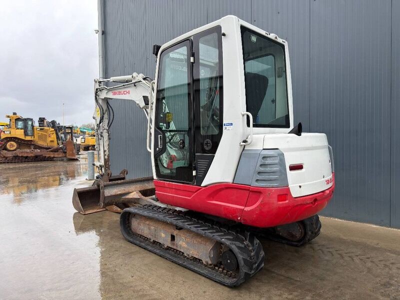 2010 Takeuchi TB235 mini excavator, rear three-quarter view 2010 Takeuchi TB235 mini excavator, rear three-quarter view