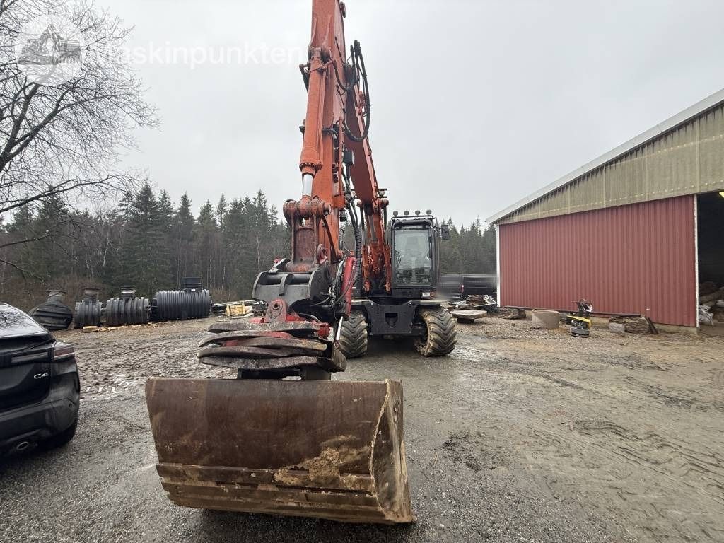 2013 Hitachi ZX140W-5 wheel excavator front view