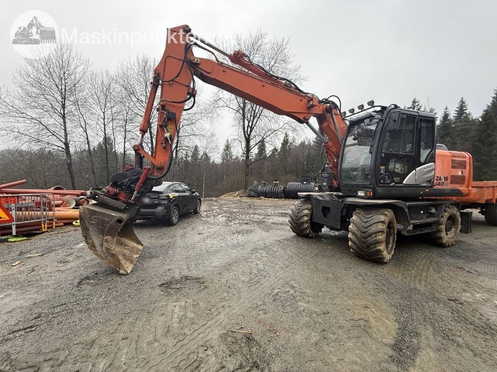 2013 Hitachi ZX140W-5 wheel excavator, side view