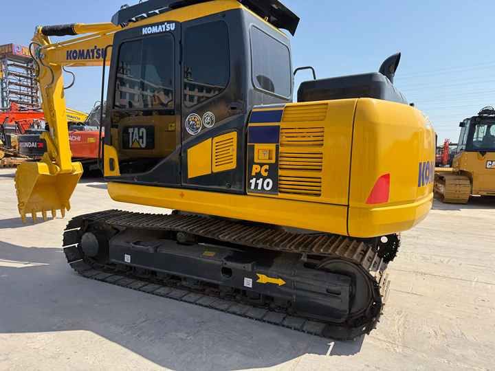 2020 Komatsu PC110 crawler excavator, rear three-quarter view 2020 Komatsu PC110 crawler excavator, rear three-quarter view