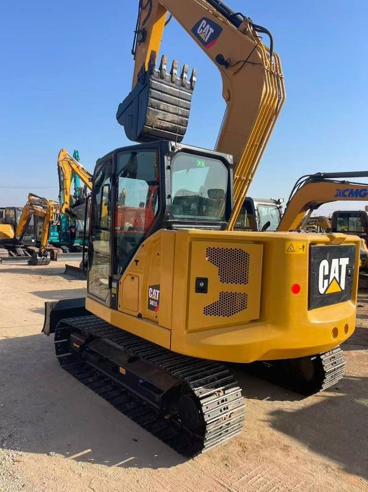 2024 Caterpillar 307.5 mini excavator, rear three-quarter view 2024 Caterpillar 307.5 mini excavator, rear three-quarter view