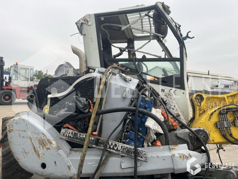 2018 Menzi Muck M220 walking excavator, side view of engine compartment