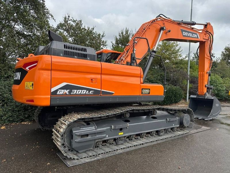 2025 Develon DX300LC-7M crawler excavator, rear three-quarter view