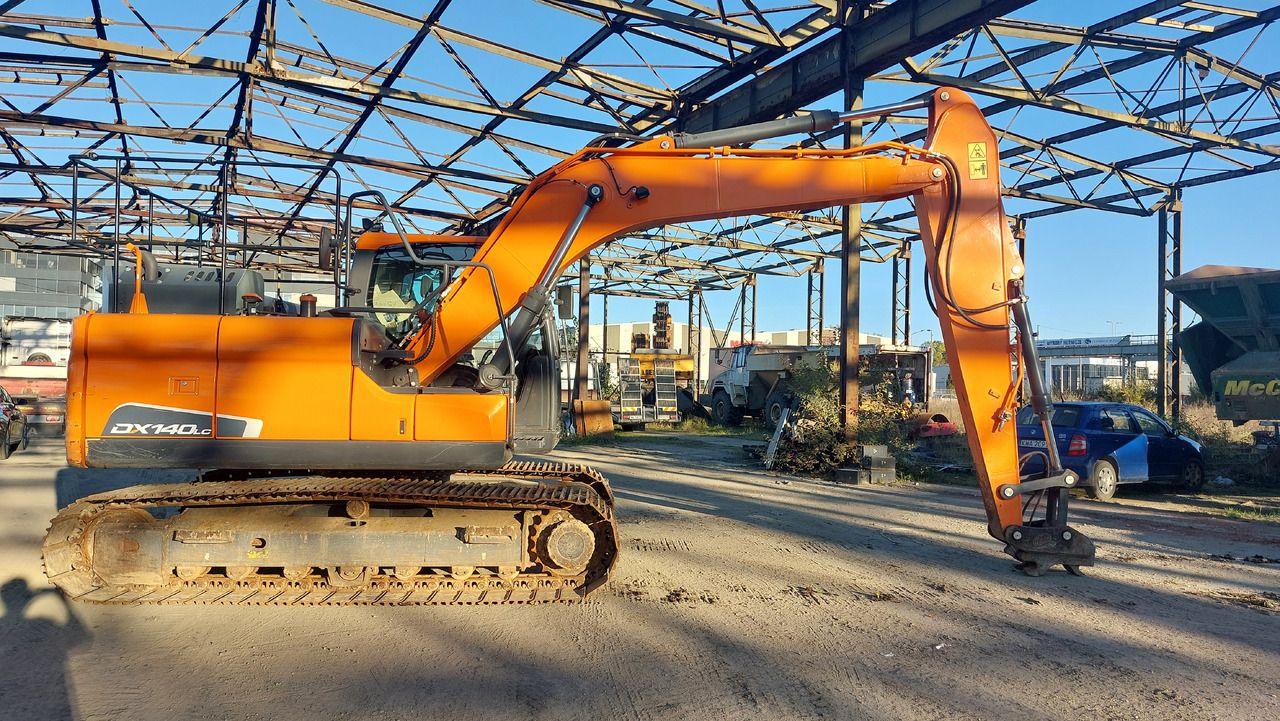 Doosan DX140LC-5 crawler excavator side view