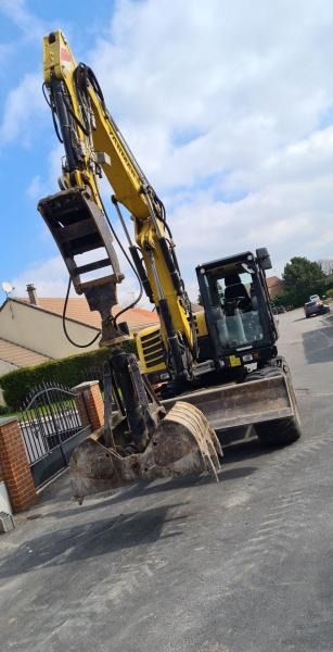 2020 Yanmar B110W wheel excavator, front three-quarter view