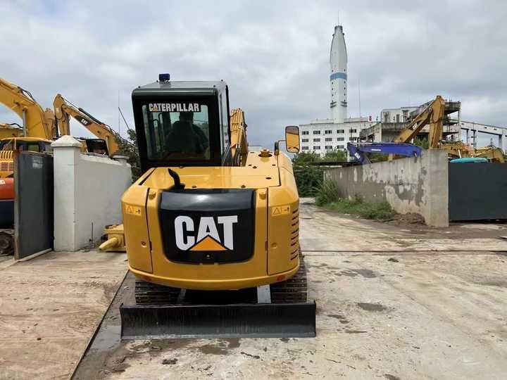 2022 Caterpillar 306E mini excavator rear view 2022 Caterpillar 306E mini excavator rear view