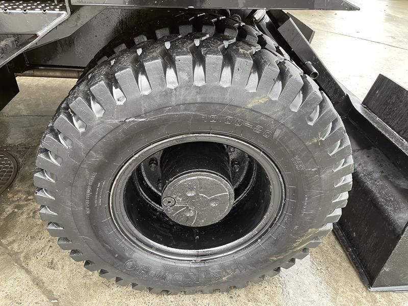 2016 Caterpillar M314F wheel excavator tire and wheel detail