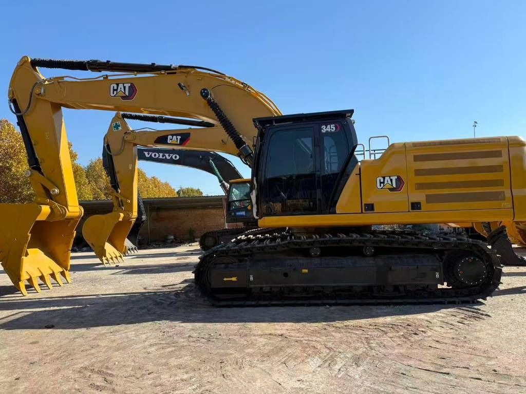 2025 Caterpillar 345 crawler excavator, side view