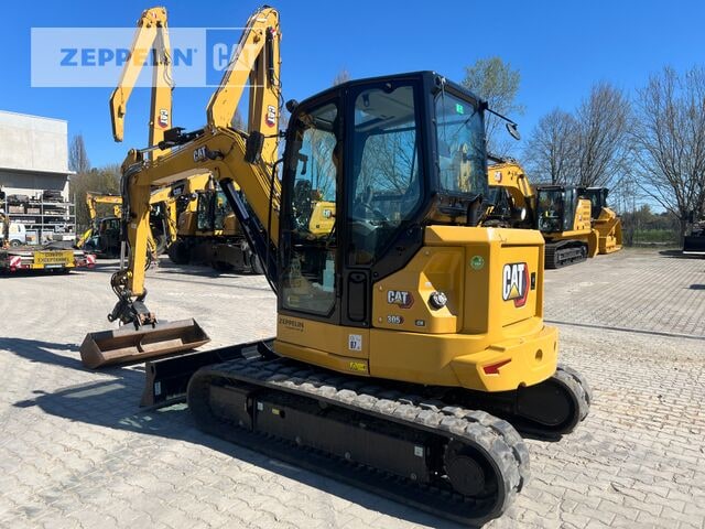 2024 Caterpillar 305 CR mini excavator, rear three-quarter view 2024 Caterpillar 305 CR mini excavator, rear three-quarter view