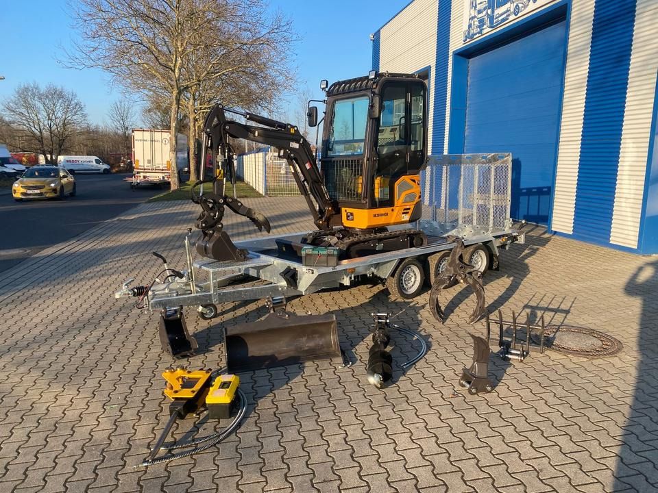 Berger Kraus BK2000NKSR mini excavator on trailer with attachments Berger Kraus BK2000NKSR mini excavator on trailer with attachments