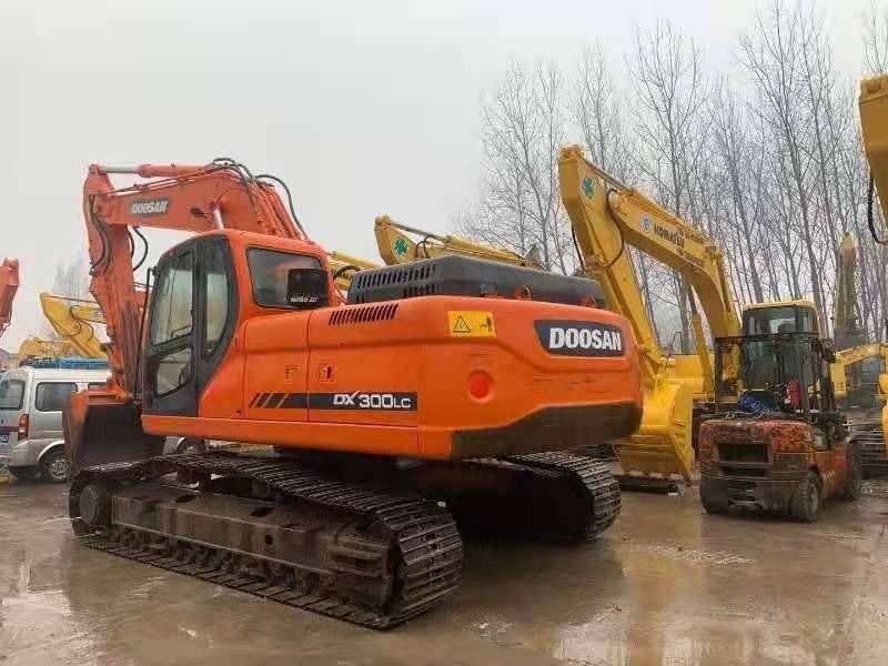 2023 Doosan DX300LC crawler excavator, rear three-quarter view