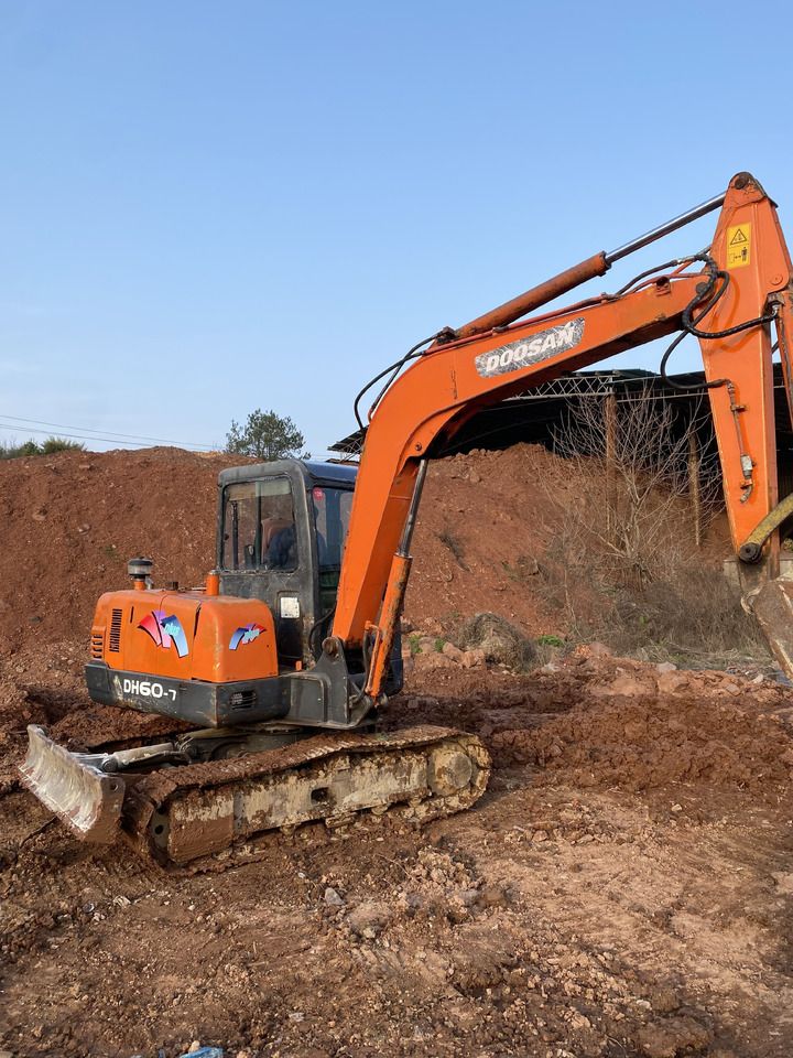 2021 Doosan DH60-7 mini excavator, side view 2021 Doosan DH60-7 mini excavator, side view