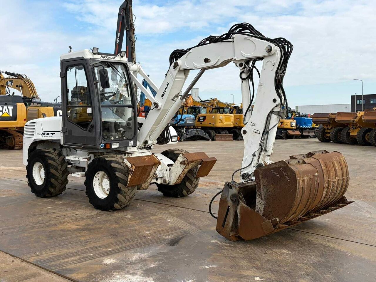 2013 Mecalac 12MXT wheel excavator, side view