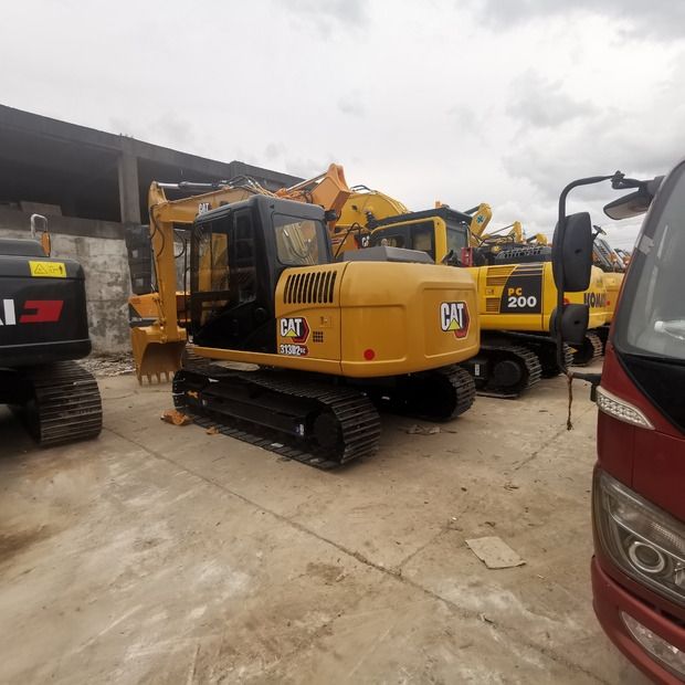 2021 Caterpillar 313D2 GC crawler excavator, rear three-quarter view 2021 Caterpillar 313D2 GC crawler excavator, rear three-quarter view