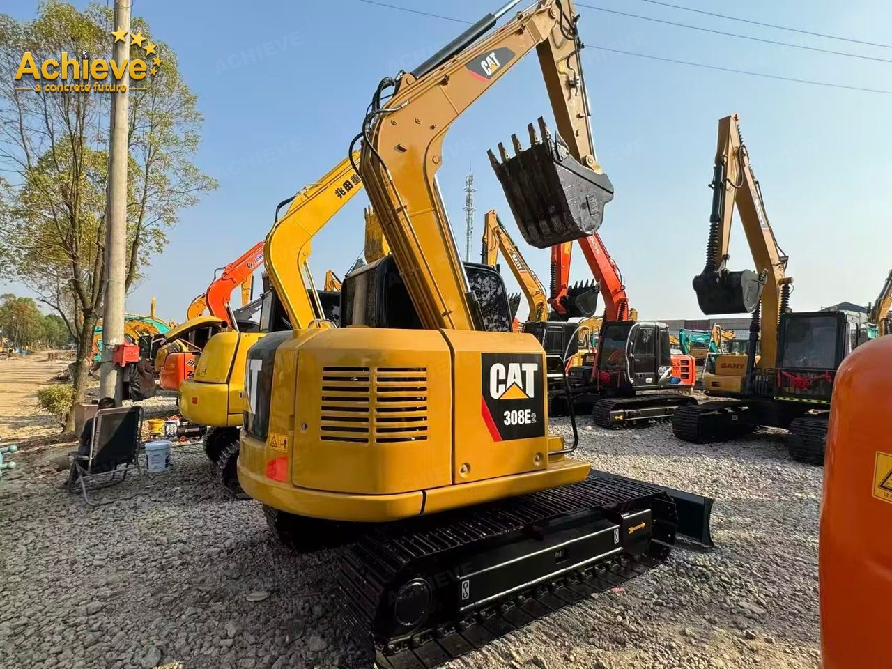 2025 Caterpillar 308E2 mini excavator, rear three-quarter view 2025 Caterpillar 308E2 mini excavator, rear three-quarter view