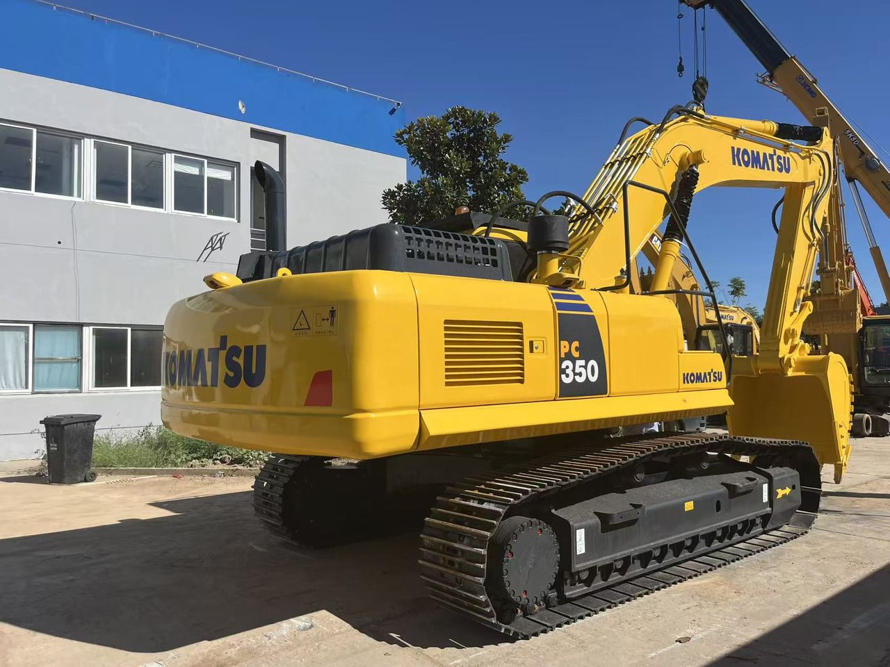 2023 Komatsu PC350 crawler excavator, rear three-quarter view