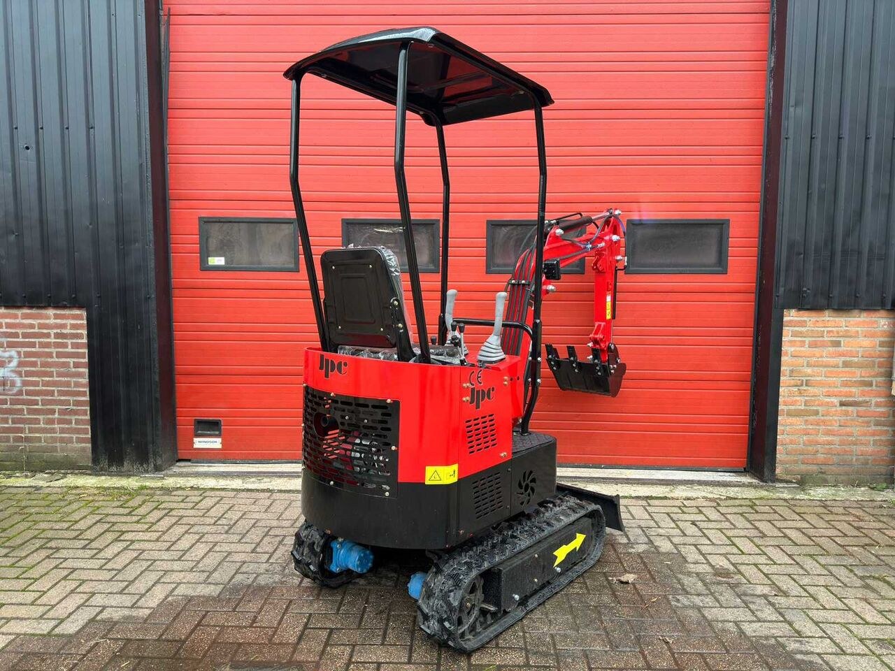 2024 JPC HT-12 mini excavator, front three-quarter view