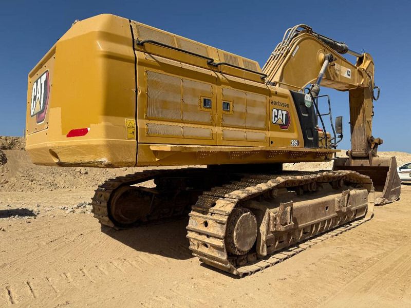 2022 Caterpillar 395 crawler excavator, rear three-quarter view 2022 Caterpillar 395 crawler excavator, rear three-quarter view