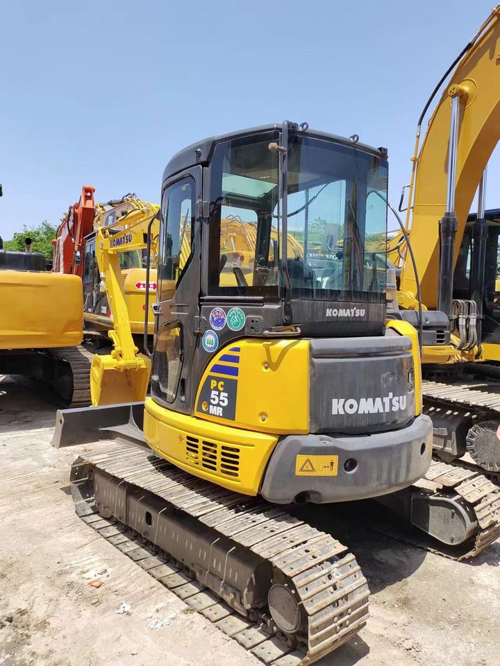 2018 Komatsu PC-55MR mini excavator, rear three-quarter view 2018 Komatsu PC-55MR mini excavator, rear three-quarter view