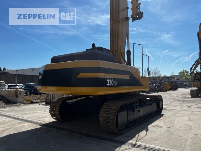 1996 Caterpillar 330LN demolition excavator, rear three-quarter view 1996 Caterpillar 330LN demolition excavator, rear three-quarter view
