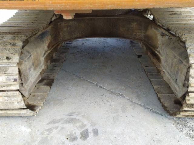 2003 Kobelco E 235 crawler excavator undercarriage view