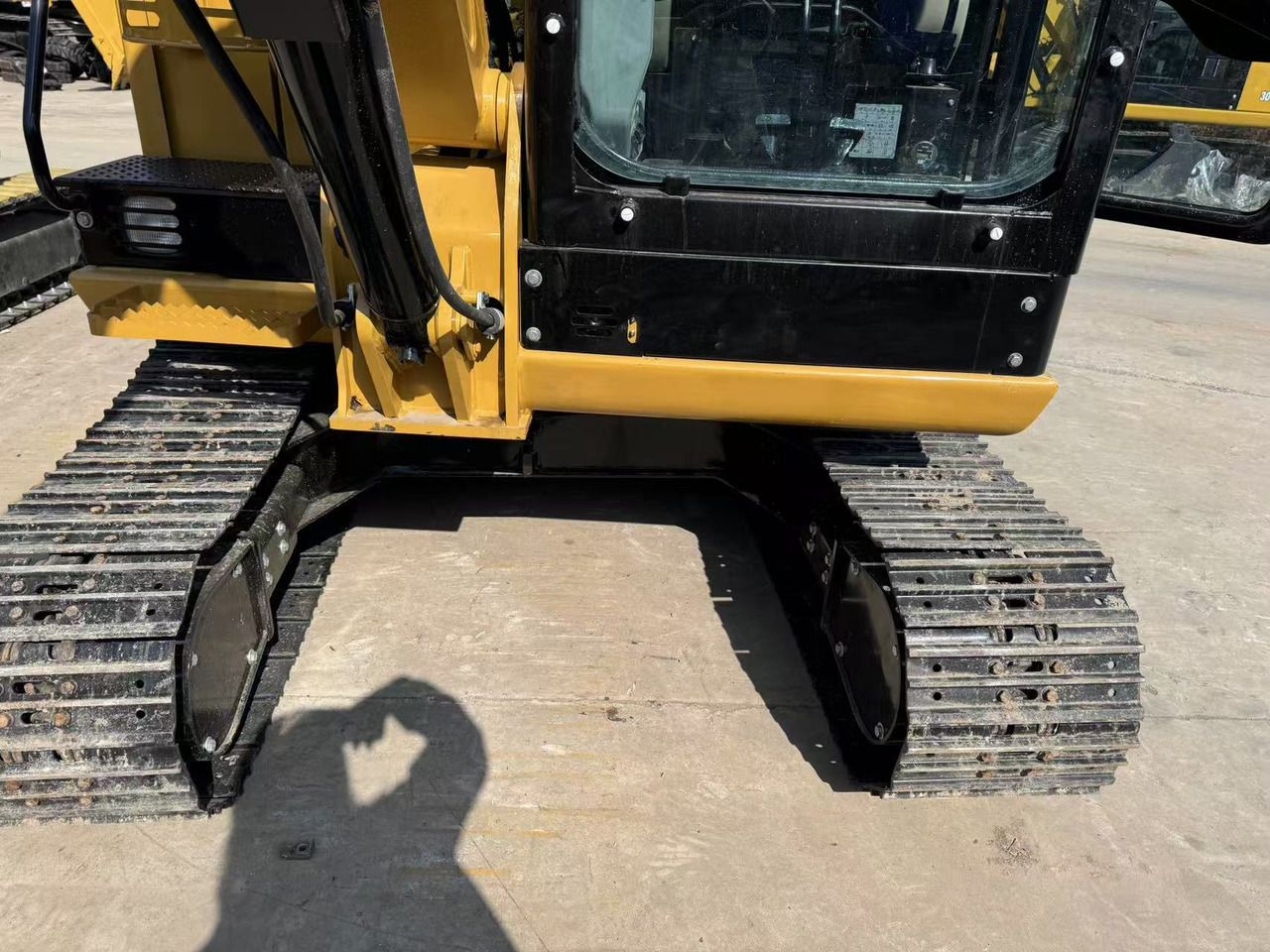 2024 Caterpillar 303.5 mini excavator lower cab and track view