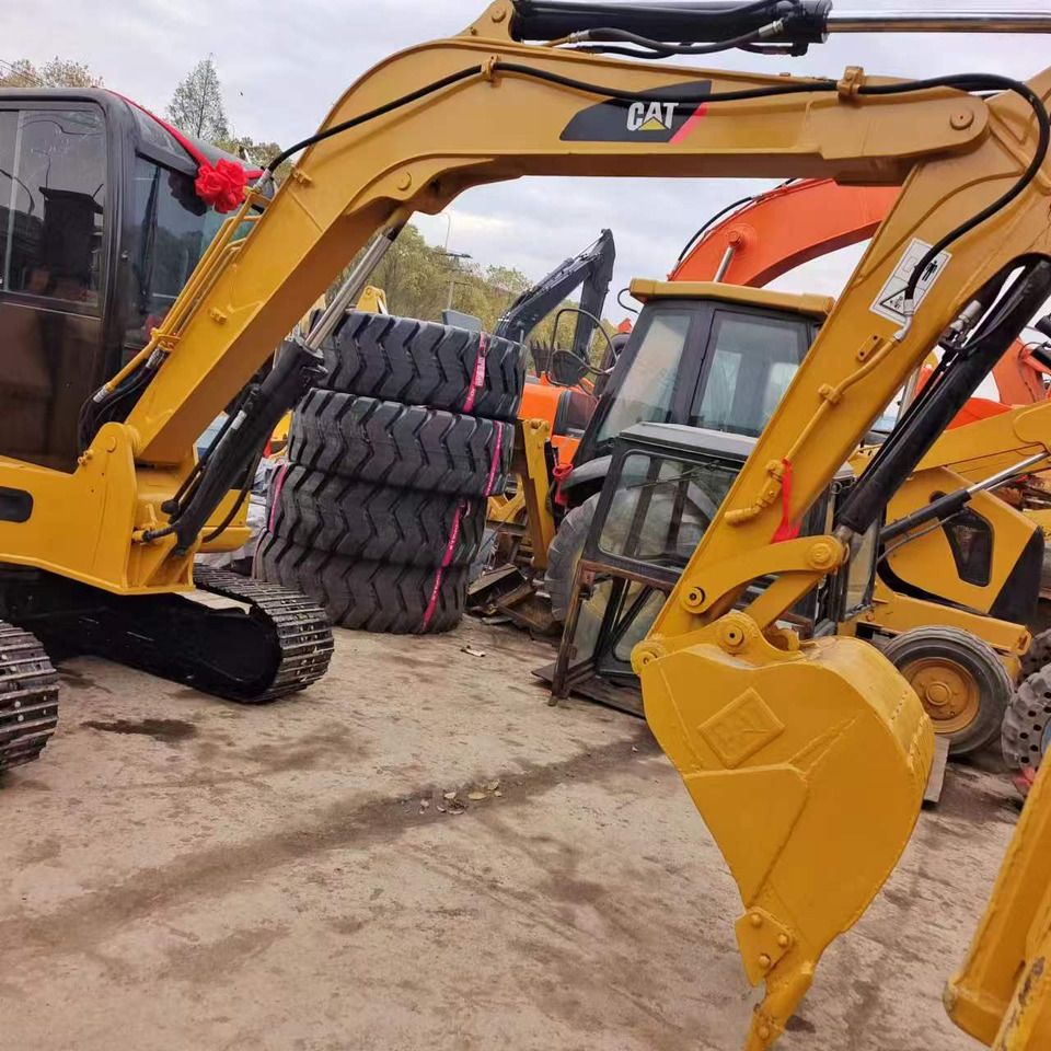 2022 Caterpillar 307E2 mini excavator side view 2022 Caterpillar 307E2 mini excavator side view