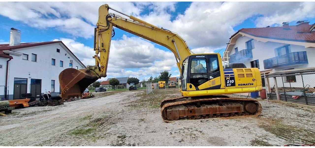 Komatsu PC210LC-10 crawler excavator, side profile view