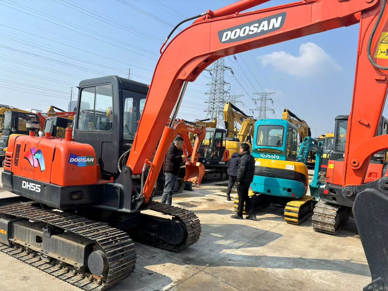 2020 Doosan DH55 mini excavator, rear three-quarter view 2020 Doosan DH55 mini excavator, rear three-quarter view