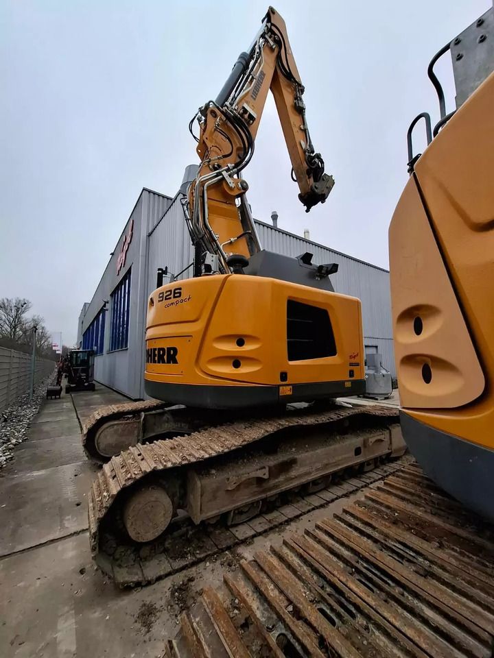 2023 Liebherr R926 Compact Litronic mini excavator, rear three-quarter view 2023 Liebherr R926 Compact Litronic mini excavator, rear three-quarter view