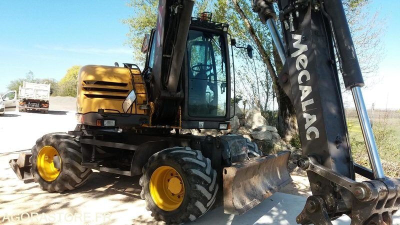 2006 Mecalac 714 MW wheel excavator, side view 2006 Mecalac 714 MW wheel excavator, side view