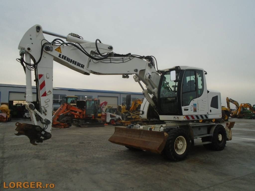2013 Liebherr A918 COMPACT wheel excavator side view 2013 Liebherr A918 COMPACT wheel excavator side view