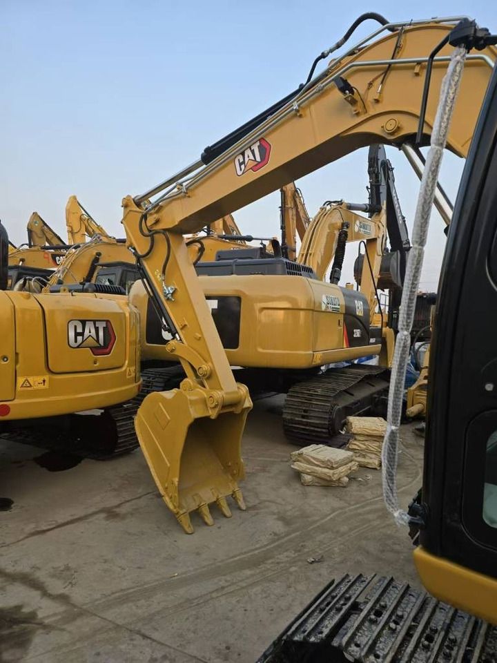 2025 Caterpillar 307 mini excavator, rear three-quarter view 2025 Caterpillar 307 mini excavator, rear three-quarter view