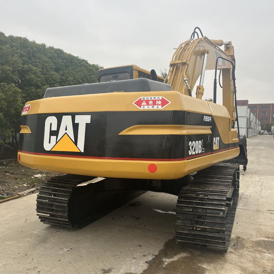 2019 Caterpillar 320BL crawler excavator, rear three-quarter view