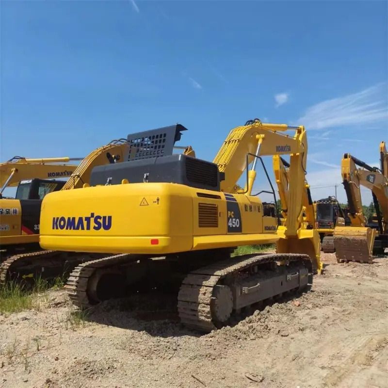 Komatsu PC450 crawler excavator, rear three-quarter view Komatsu PC450 crawler excavator, rear three-quarter view