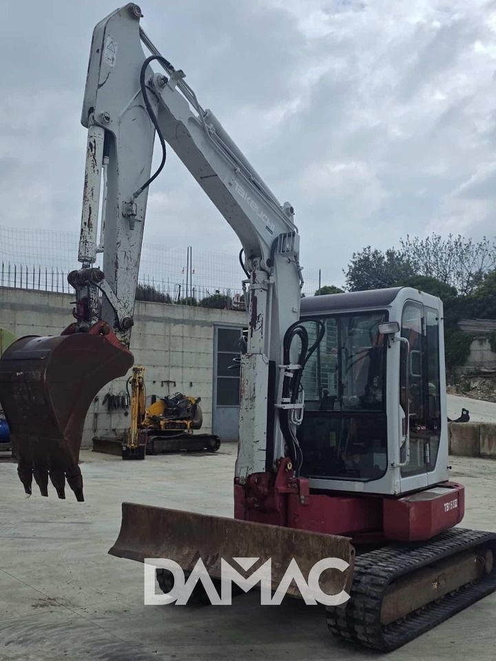 2007 Takeuchi TB153 mini excavator, front three-quarter view 2007 Takeuchi TB153 mini excavator, front three-quarter view