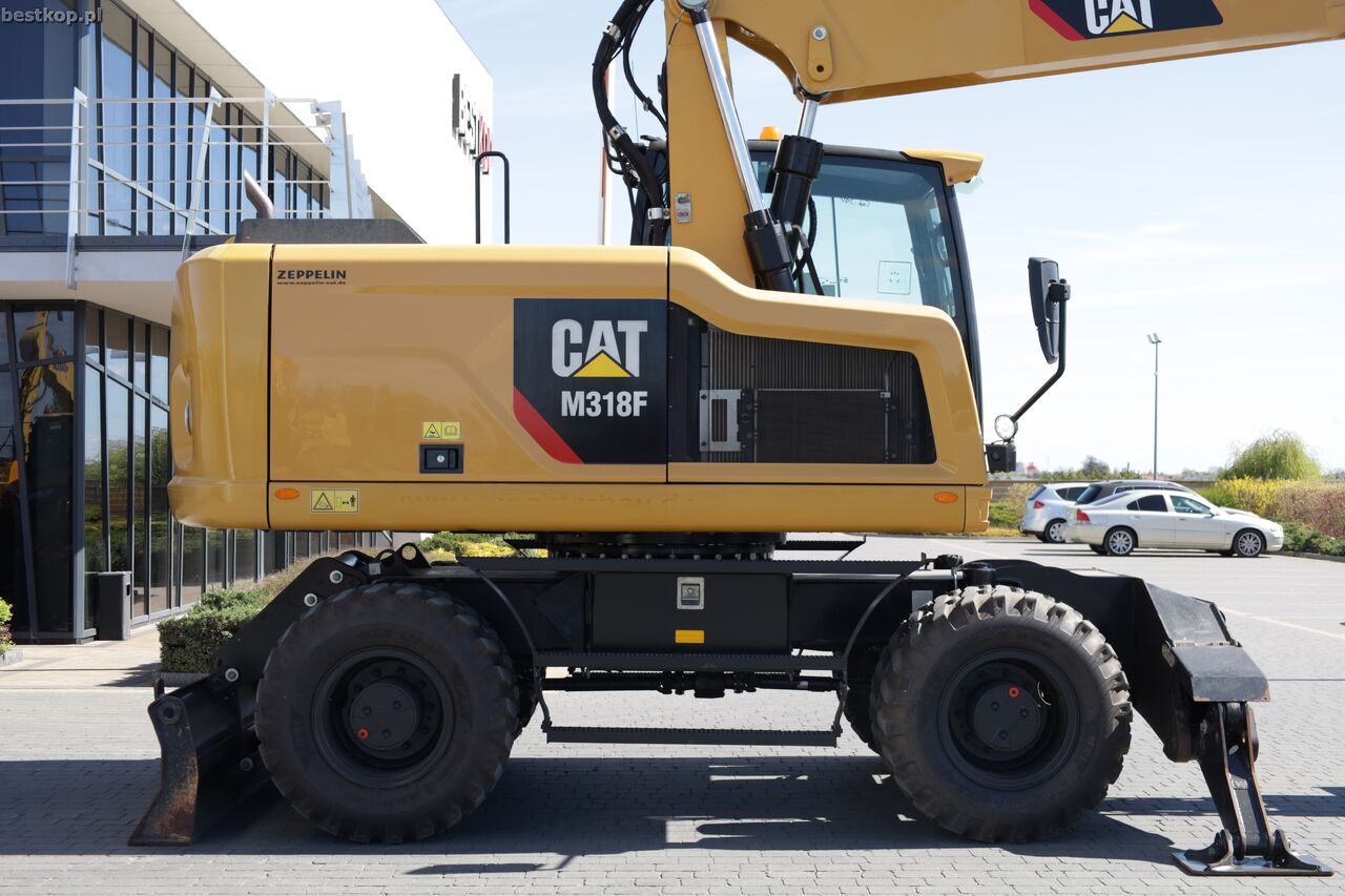 2016 Caterpillar M318F wheel excavator side view 2016 Caterpillar M318F wheel excavator side view