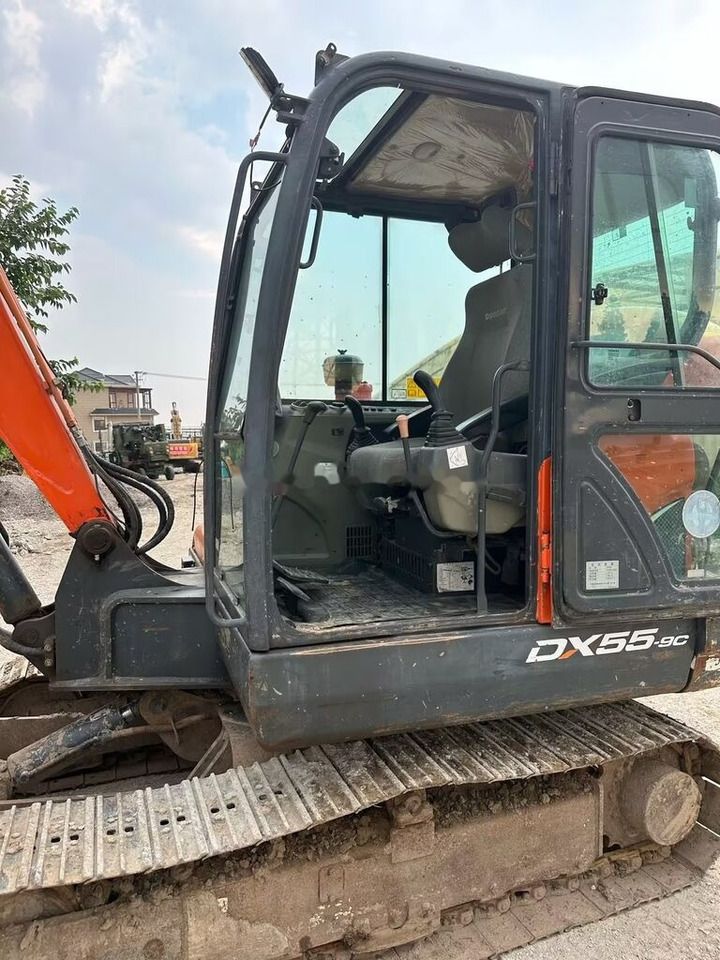 2018 Doosan DX55-9C mini excavator side view 2018 Doosan DX55-9C mini excavator side view