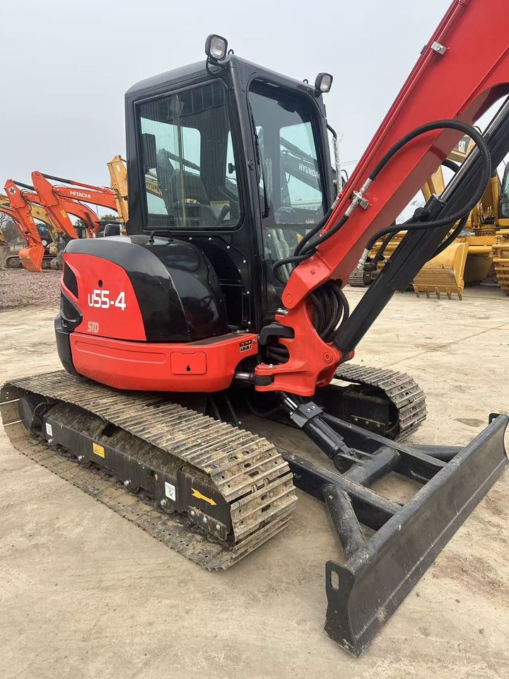 Kubota U55-4 crawler excavator, side view Kubota U55-4 crawler excavator, side view